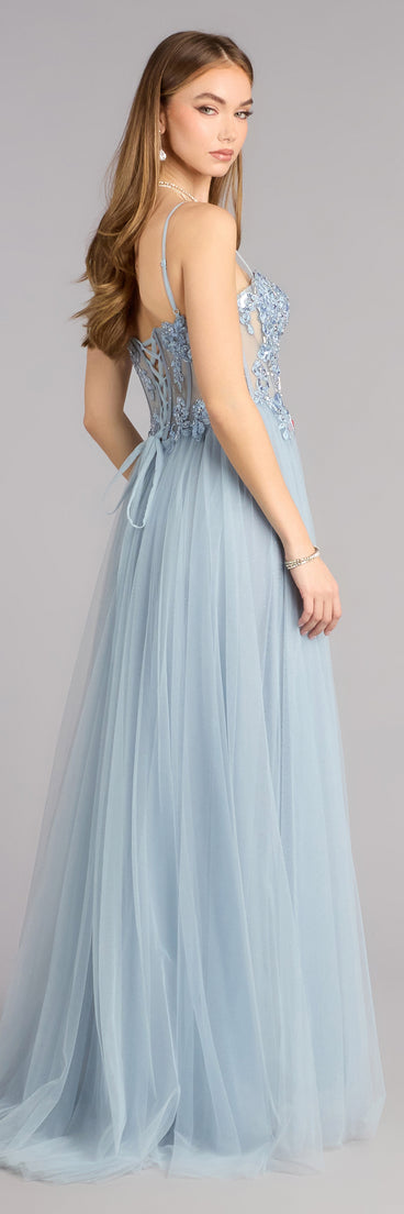 Style a ball gown like the Melissa Corset Tulle A-Line Ball Gown in light blue designed with a full skirt, defined waist, and refined finish for special occasions.