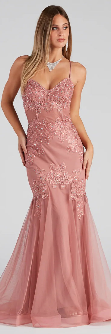 Make a bold statement in the Jenika Formal Embroidered Ball Gown in rose, the perfect spring dress for weddings, cocktail hours, nights out, and/or seasonal celebrations.