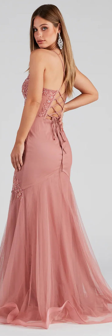 Make a bold statement in the Jenika Formal Embroidered Ball Gown in rose, the perfect spring dress for weddings, cocktail hours, nights out, and/or seasonal celebrations.
