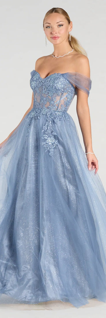 The Yarelis Corset A-Line Glitter Tulle Ball Gown in luxe light blue fabric, a stunning prom dress with statement details designed to make a bold impression at Prom 2025.