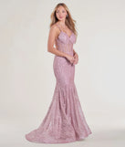 The Loreli Lace-Up Glitter Striped Mermaid Gown in luxe pink fabric, a stunning prom dress with statement details designed to make a bold impression at Prom 2025.