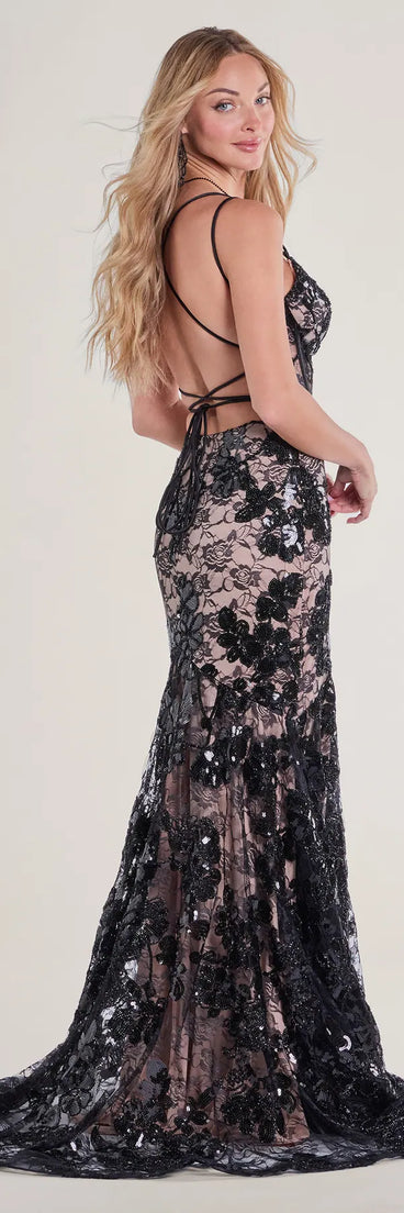 The Daniella Bustier Lace-Up Lace Sequin Mermaid Gown is a show-stopping black prom dress, offering a sleek, slimming silhouette that enhances your natural beauty for an unforgettable night.