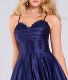 Make a bold statement in the Tessa Corset Lace-Up A-Line Satin Ball Gown in navy blue, the perfect spring dress for weddings, cocktail hours, nights out, and/or seasonal celebrations.