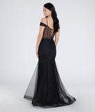The Cleo Floral Embroidered Tulle Corset Mermaid Gown is a show-stopping black prom dress, offering a sleek, slimming silhouette that enhances your natural beauty for an unforgettable night.
