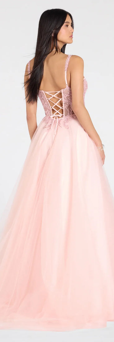 Turn heads at Prom 2025 in this pink prom dress, where statement-making details meet the iconic style of the Mae Corset Lace-Up A-Line Ball Gown.