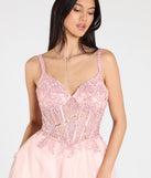 Turn heads at Prom 2025 in this pink prom dress, where statement-making details meet the iconic style of the Mae Corset Lace-Up A-Line Ball Gown.