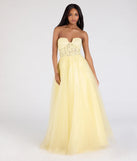The Gwen Strapless Corset A-Line Glitter Ball Gown in luxe yellow fabric, a stunning prom dress with statement details designed to make a bold impression at Prom 2025.