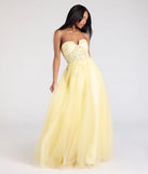 The Gwen Strapless Corset A-Line Glitter Ball Gown in luxe yellow fabric, a stunning prom dress with statement details designed to make a bold impression at Prom 2025.