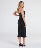 With its mid-calf hem and popular flattering fit, the Keep Knit It Sleek Midi Dress in black nails the balance of trend and ease, redefining go-to midi dresses for any occasion.