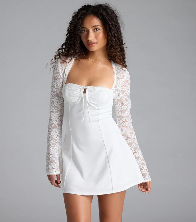Feel confident and photo-ready in the Flirty Factor Lace Long Sleeve Crepe Mini Dress, a white graduation dress perfect for 2025 ceremonies and parties.