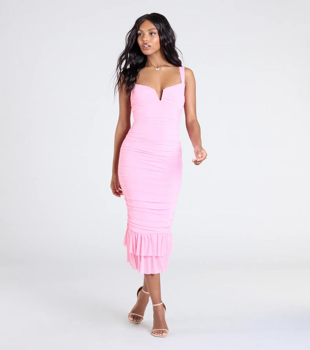 With its mid-calf hem and popular flattering fit, the Turn On The Charm Ruffled Mesh Midi Dress in pink nails the balance of trend and ease, redefining go-to midi dresses for any occasion.