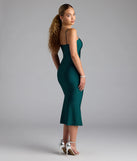 Step into summer looking effortlessly chic in the Best Behavior Sleeveless Midi Dress in hunter green, a must-have Windsor dress for your warm-weather wardrobe.