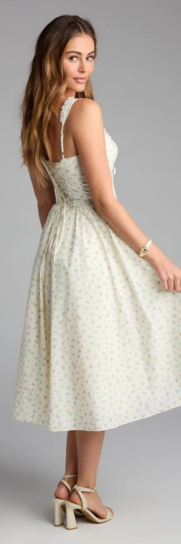 The Soft Girl Floral Drop Waist Midi Dress in yellow features a flattering fit and mid-calf hem, redefining effortless midi dresses for any occasion.