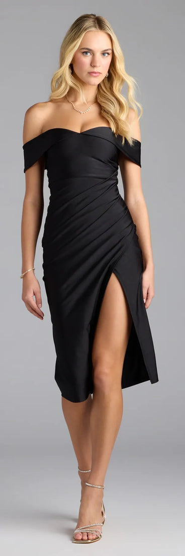 Feel instantly put-together in the Classic Allure Off-The-Shoulder Midi Dress in black, a stylish wedding guest dress designed for confident style and all-out celebration.