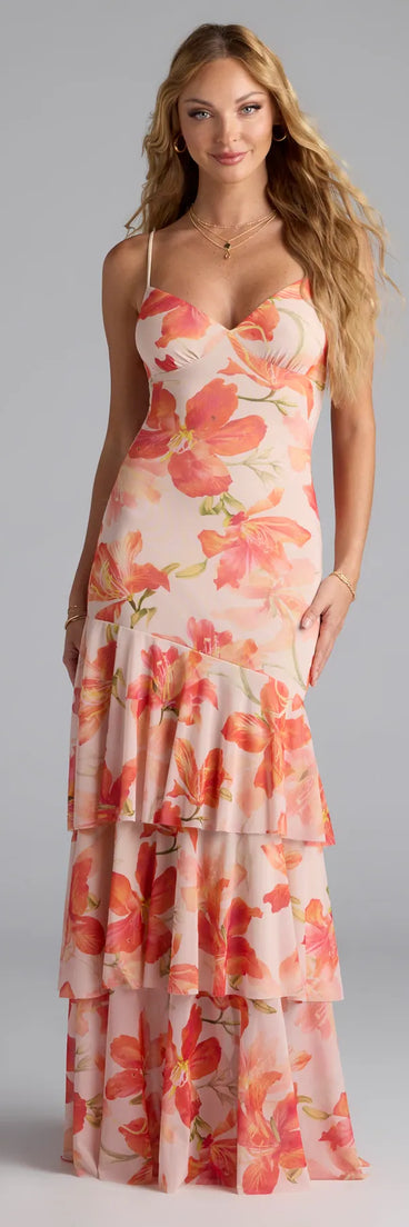Feel instantly put-together in the Blissful Aura Floral Ruffle Maxi Dress in orange, a summer wedding guest dress designed for confident style and all-out celebration.
