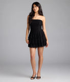 Step into summer looking effortlessly chic in the Lovely Nights Strapless Lace Ruffle Skater Dress in black, a must-have Windsor dress for your warm-weather wardrobe.