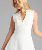 Step into summer looking effortlessly chic in the Classically Sleek Sleeveless A-Line Mini Dress in white, a must-have Windsor dress for your warm-weather wardrobe.