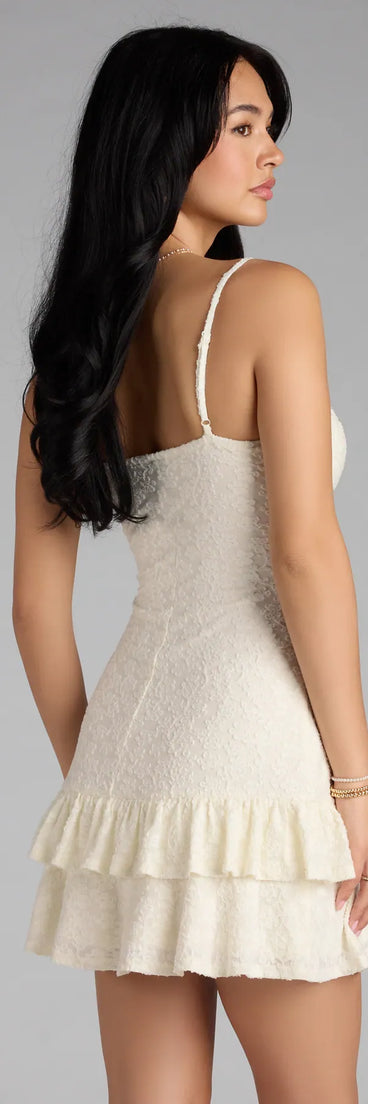 Own your moment in the Adorable Vibe Ruffle Lace Mini Dressin ivory, a standout 2025 Homecoming Dress that captures all the glam and energy of the night.