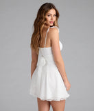 Shine with confidence, elegance, and standout style in the Cutest Ever Flutter Sleeve Mini Dress—a white graduation dress designed with a fresh silhouette and the latest trends.