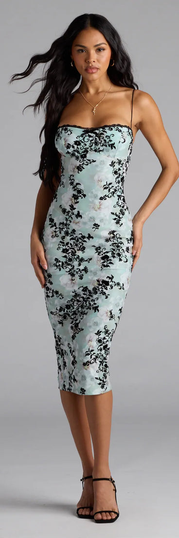 Feel instantly put-together in the Match Made In Floral Bodycon Midi Dress in sage green, a summer wedding guest dress designed for confident style and all-out celebration.