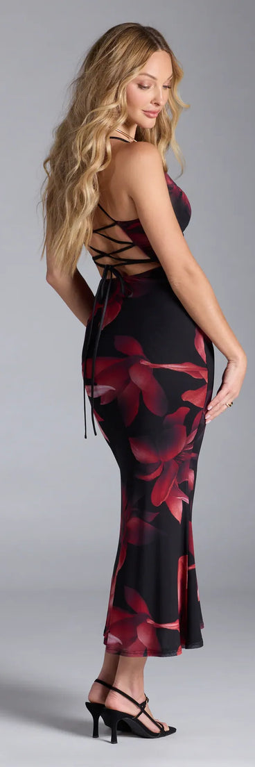 The Captivating Floral Mesh Lace-Up Midi Dress in black features a flattering fit and mid-calf hem, redefining effortless midi dresses for any occasion.