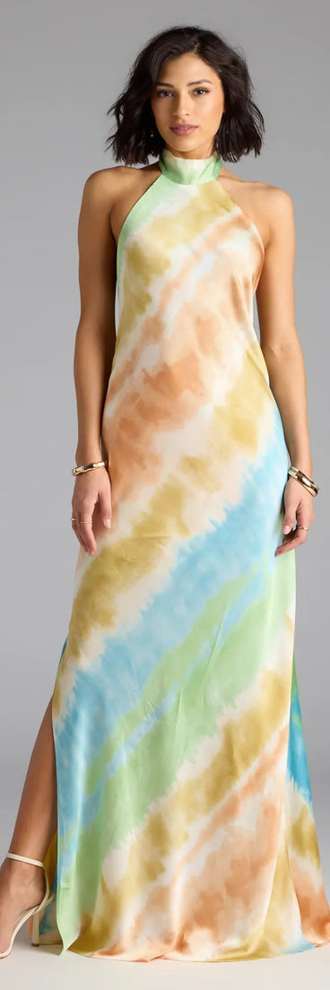The True Colors Open Back Abstract Satin Maxi Dress is a flowy, green maxi dress that moves with you from sunny days to elevated nights in effortless style.