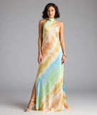 The True Colors Open Back Abstract Satin Maxi Dress is a flowy, green maxi dress that moves with you from sunny days to elevated nights in effortless style.