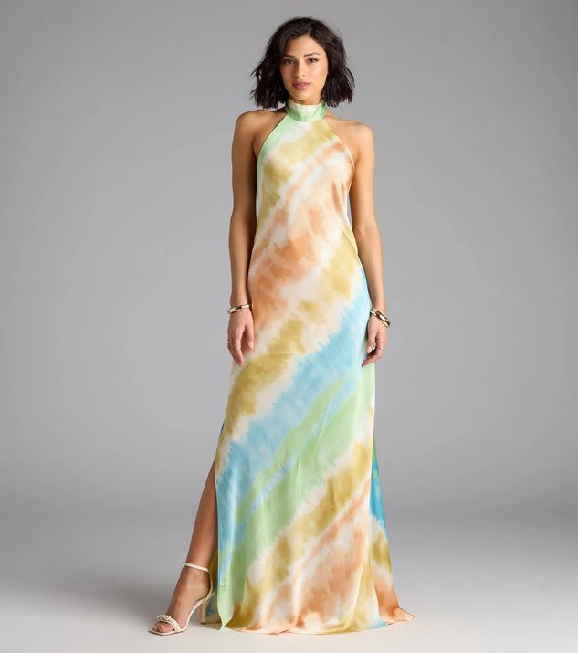 The True Colors Open Back Abstract Satin Maxi Dress is a flowy, green maxi dress that moves with you from sunny days to elevated nights in effortless style.