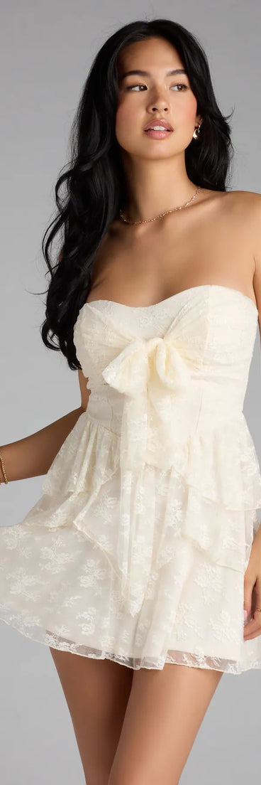 Own your moment in the Love Stories Tie Front Ruffle Lace Skater Dressin ivory, a standout 2025 Homecoming Dress that captures all the glam and energy of the night.