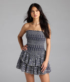 Step into summer looking effortlessly chic in the Match My Energy Eyelet Skater Dress in navy blue, a must-have Windsor dress for your warm-weather wardrobe.