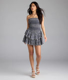 Step into summer looking effortlessly chic in the Match My Energy Eyelet Skater Dress in navy blue, a must-have Windsor dress for your warm-weather wardrobe.