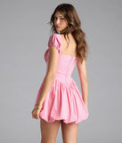 The Bright Side Puff Sleeve Skater Bubble Hem Dress in pink brings sleek style to any graduation outfit, from cap and gown to after-party.