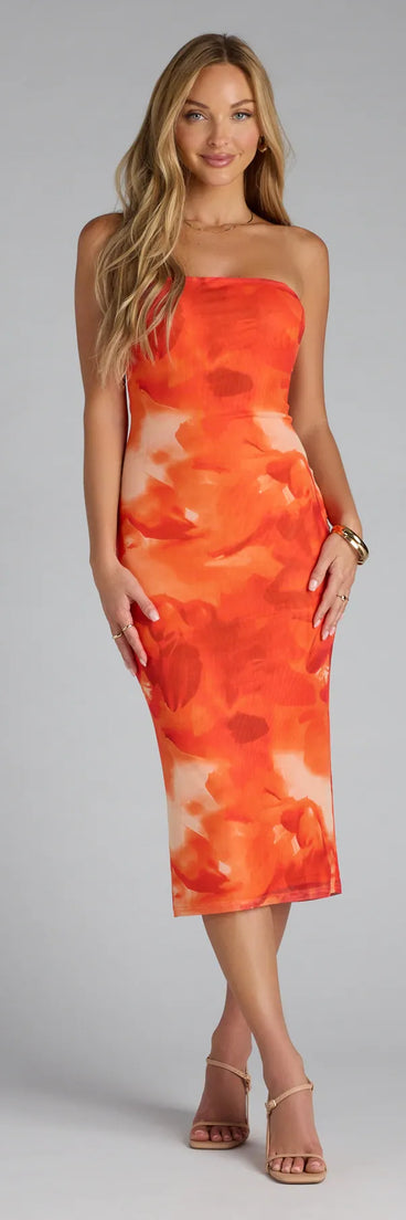 The Muse Mode Abstract Print Midi Tube Dress in orange features a flattering fit and mid-calf hem, redefining effortless midi dresses for any occasion.