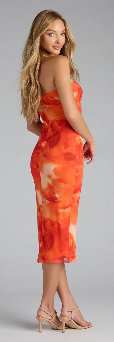 The Muse Mode Abstract Print Midi Tube Dress in orange features a flattering fit and mid-calf hem, redefining effortless midi dresses for any occasion.