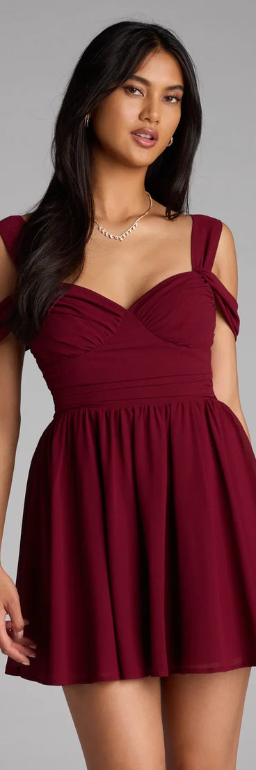 Steal the spotlight in the Flowy Chic Chiffon Cold-Shoulder Skater Dress in wine, a fiery pick from the red homecoming dresses collection designed for bold entrances.
