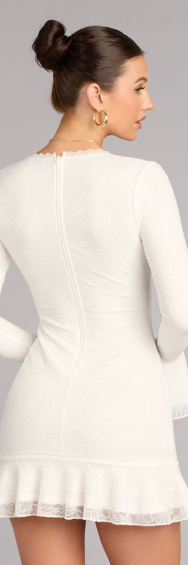 The Quiet Romance Lace Mini Dress is a ivory long sleeve dress with a sleek design that brings both coverage and standout style.