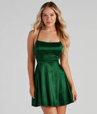 Step into seasonal chic with the A Moment In Satin Skater Dress, a hunter mini dress featuring an above-the-knee cut ideal for cocktail parties, festive gatherings, or clubwear.