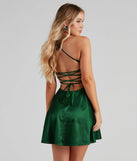Make a bold statement in the A Moment In Satin Skater Dress in hunter green, the perfect green dress for weddings, cocktail hours, nights out, and/or seasonal celebrations.