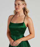 Step into seasonal chic with the A Moment In Satin Skater Dress, a hunter mini dress featuring an above-the-knee cut ideal for cocktail parties, festive gatherings, or clubwear.