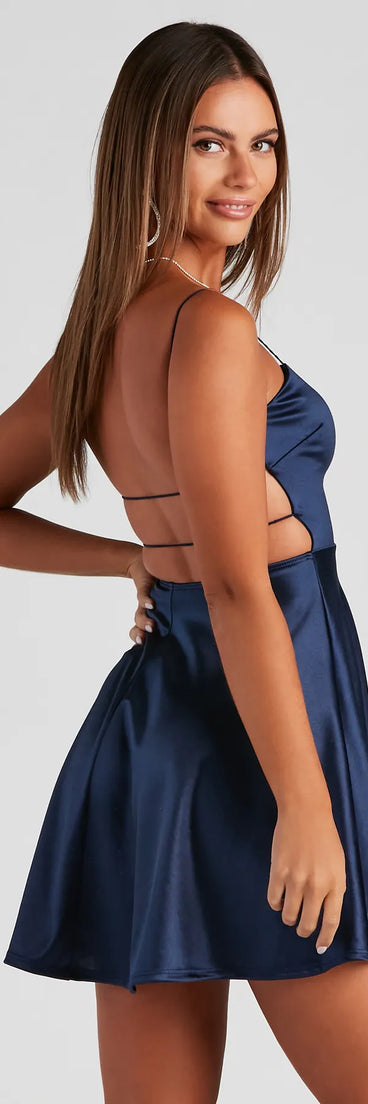 Revamp your 2025 wardrobe with this chic addition, the Grand Exit Satin Skater Dress in navy, perfect for elevating your style in the new year.