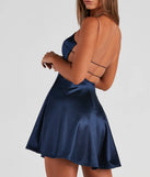 Revamp your 2025 wardrobe with this chic addition, the Grand Exit Satin Skater Dress in navy, perfect for elevating your style in the new year.