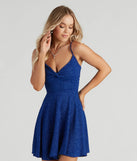 Step into winter chic with the Spectacular Twirl Glitter Skater Dress, a blue mini dress featuring an above-the-knee cut ideal for cocktail parties, festive gatherings, or clubwear.