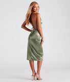 Revamp your 2025 wardrobe with this chic addition, the Luxurious Night Satin Midi Dress in sage green, perfect for elevating your style in the new year.