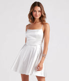 Step into seasonal chic with the A Moment In Satin Skater Dress, a white mini dress featuring an above-the-knee cut ideal for cocktail parties, festive gatherings, or clubwear.