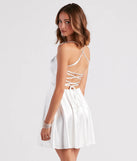 The A Moment In Satin Skater Dress is a mini dress in white, perfect for an above-the-knee party dress or a bold cocktail look, with a short hemline designed to make a statement.
