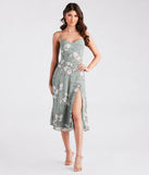 The Garden Chic Floral Chiffon Midi Dress in sage is a women's workwear essential with an elevated fabric and chic silhouette, ideal for layering and versatile enough to take your look from office chic to going-out ready!