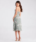 The Garden Chic Floral Chiffon Midi Dress in sage is a women's workwear piece offering a trendy style and unique accents, perfect for effortlessly creating an outfit-of-the-day look that transitions your office look to going-out ready.