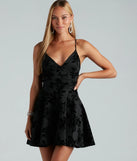 Step into seasonal chic with the Divine Allure Ponte Floral Velvet Skater Dress, a black mini dress featuring an above-the-knee cut ideal for cocktail parties, festive gatherings, or clubwear.