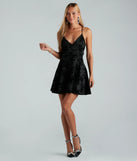 Make a bold statement in the Divine Allure Ponte Floral Velvet Skater Dress in black, the perfect spring dress for weddings, cocktail hours, nights out, and/or seasonal celebrations.