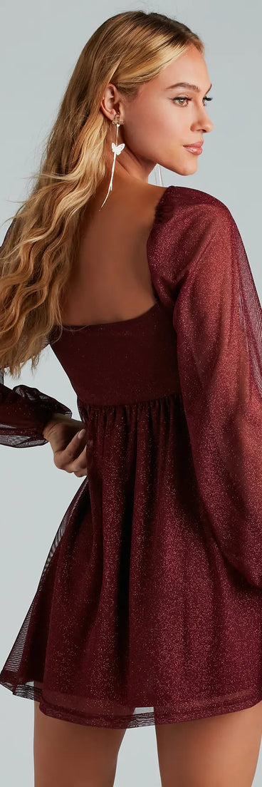 The Countless Shine Glitter Skater Dress is a wine long sleeve dress with a sleek design that brings both coverage and standout style.